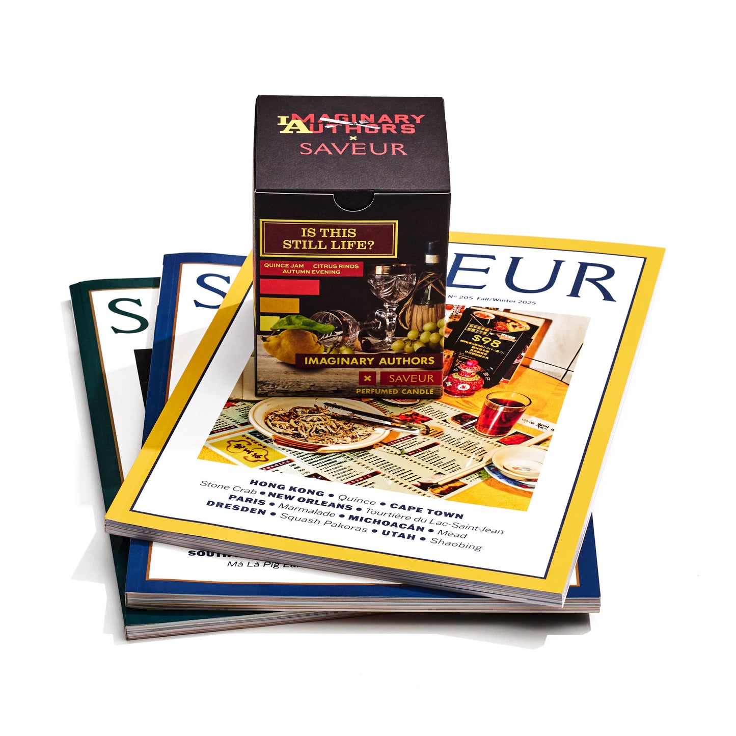 Imaginary Authors X SAVEUR Is This Still Life? candle box, SAVEUR Fall/Winter 2025 magazine copy with two SAVEUR magazines peeking out from underneath