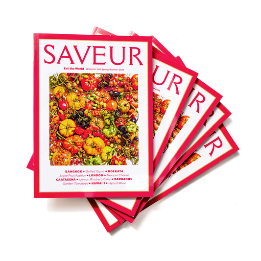 Stack of SAVEUR magazines issue No. 206; Spring/Summer 2026 on white background